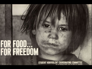 Child with dirty face; text: for food...for freedom, Student Nonviolent Coordinating Committee.